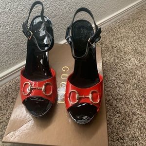 Red and black Gucci shoes